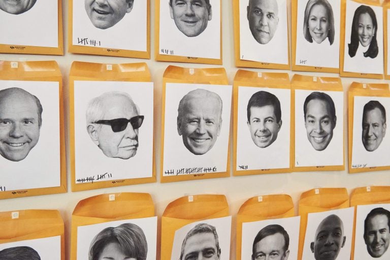 A wall titled “Who’s The Next To Drop Out?” with faces of the Democratic candidates running for president in the 2020 election is displayed during the Netroots Nation conference at the Pennsylvania Convention Center in Philadelphia on Saturday. A wall titled