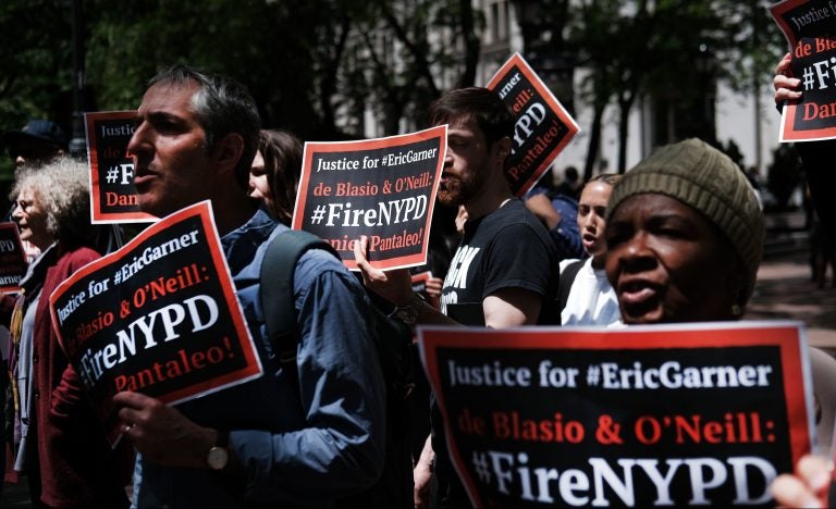 Protesters gathered outside of Police Headquarters in Manhattan in May to protest during the police disciplinary hearing for Officer Daniel Pantaleo, who was accused of using a chokehold that led to Eric Garner's death in 2014.