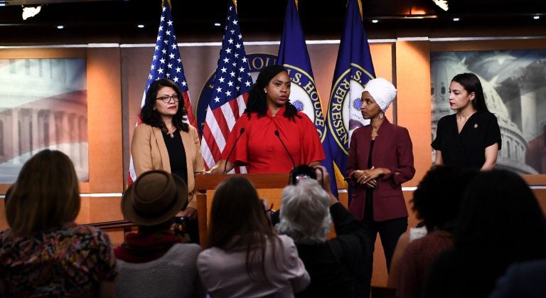 Rep. Ayanna Pressley, D-Mass., with Reps. Rashida Tlaib of Michigan (from left), Ilhan Omar of Minnesota and Alexandria Ocasio-Cortez of New York during a press conference on Monday to address racist remarks made by President Trump. (Brendan Smialowski/AFP/Getty Images)