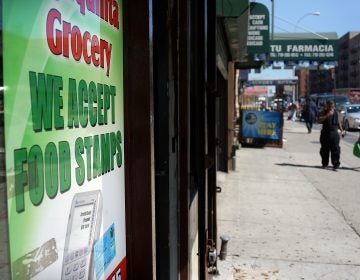 A grocery store in New York City advertises that it accepts food stamps. A Trump administration proposal could result in 3 million people losing their food assistance.