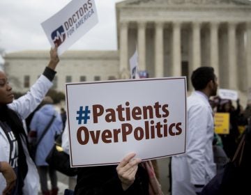 Demonstrators from Doctors for America marched in support of the Affordable Care Act outside the U.S. Supreme Court in March 2015. Now, another case aims to undo the federal health law: Texas v. United States could land in front of the Supreme Court ahead of the 2020 election