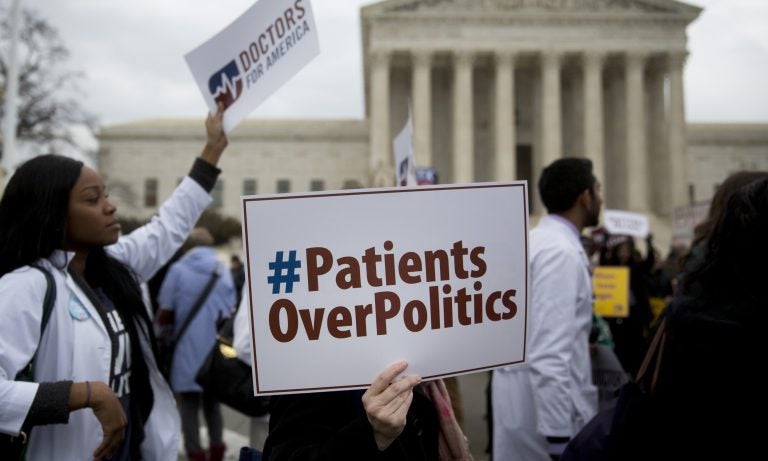 Demonstrators from Doctors for America marched in support of the Affordable Care Act outside the U.S. Supreme Court in March 2015. Now, another case aims to undo the federal health law: Texas v. United States could land in front of the Supreme Court ahead of the 2020 election