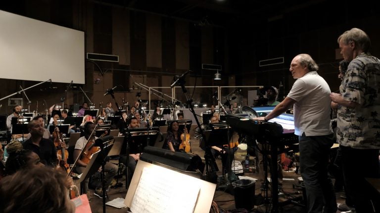 Hans Zimmer, Matt Jones of the Re-Collective Orchestra and conductor Nick Glennie-Smith at a scoring session for Disney's The Lion King. (Alberto Rodriguez/Disney Enterprises, Inc.)