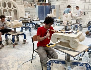 Students chip and chisel away at heavy slabs of stone in the workshops of the Hector Guimard high school, less than three miles from Paris' Notre Dame cathedral. (Eleanor Beardsley/NPR)