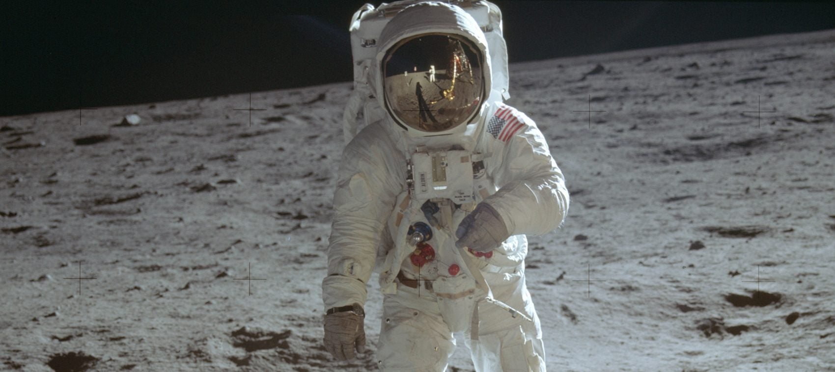 In this July 20, 1969 photo made available by NASA, astronaut Buzz Aldrin, lunar module pilot, walks on the surface of the moon near the leg of the Lunar Module 