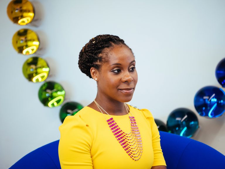 Altovise Ewing, who has a doctorate in human genetics and counseling, now works as a genetic counselor and researcher at 23andMe, one of the largest direct-to-consumer genetic testing companies, based in Mountain View, Calif. (Karen Santos for NPR)