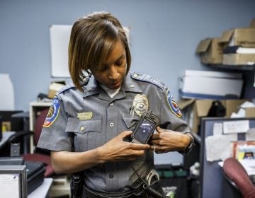 Susquehanna Township police Lt. Francia Done shows a Motorola body camera. May 15, 2019. (Dan Gleiter/PennLive)