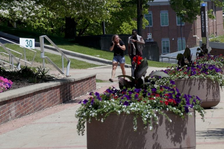 In this photo from Friday, May 24, 2019, visitors walk through the campus of Slippery Rock University in Slippery Rock, Pa. (Keith Srakocic/AP Photo)