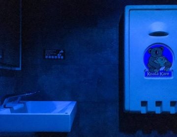 Blue lights bathe the bathroom at a Center City Starbucks MICHAELA WINBERG / BILLY PENN
