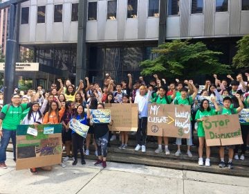 Vietnamese community members in front of 1515 Arch Street. (Courtesy of 18MillionRising)