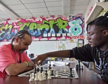 Doug Cox (left) teaches mathematics and engineering at El Centro. He also leads the Dark Knights chess club. (Kimberly Paynter/Keystone Crossroads)