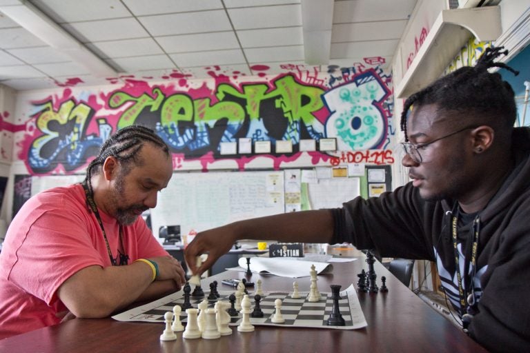 Doug Cox (left) teaches mathematics and engineering at El Centro. He also leads the Dark Knights chess club. (Kimberly Paynter/Keystone Crossroads)