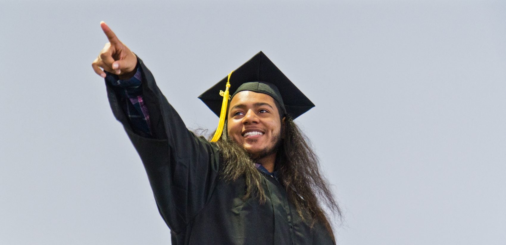 Joshua Martinez, high school graduate. 'We out this jawn.' (Kimberly Paynter/Keystone Crossroads)