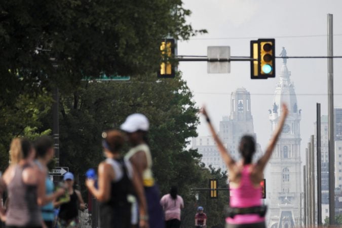 Runners take over North Broad Street during Philly Free Streets on Saturday. (Bastiaan Slabbers for WHYY)