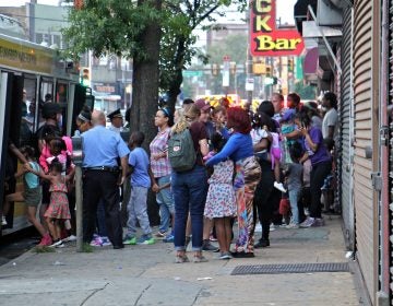 Children from the Precious Babies daycare are evacuated after a mass shooting in North Philadelphia. (Emma Lee/WHYY)