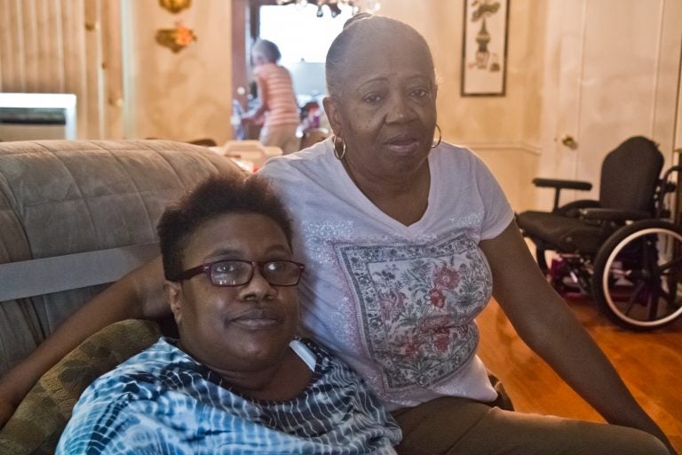 Diane Southerland and her daughter Terry in their Logan home. (Kimberly Paynter/WHYY)