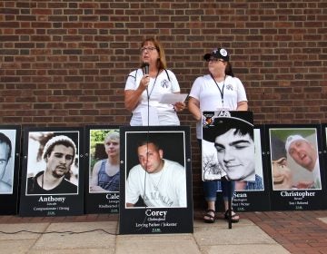 Cheryl Juaire (left) and Tracy Martin of Team Sharing, a national support group for parents of overdose victims, speak at a rally outside the federal courthouse in Philadelphia in support of supervised injection sites. (Emma Lee/WHYY)