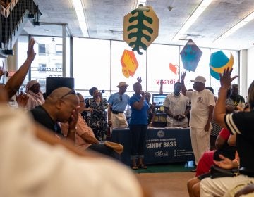 Hands are raised in response to Councilwoman Cindy Bass asking people who has experienced gun violence during a community meeting at the Nicetown-Tioga Library on Saturday, August 17, 2019. (Kriston Jae Bethel for WHYY)