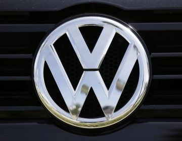 This Sept. 21, 2015, file photo, shows the Volkswagen logo on a car for sale at New Century Volkswagen dealership in Glendale, Calif. (Damian Dovarganes/AP Photo)