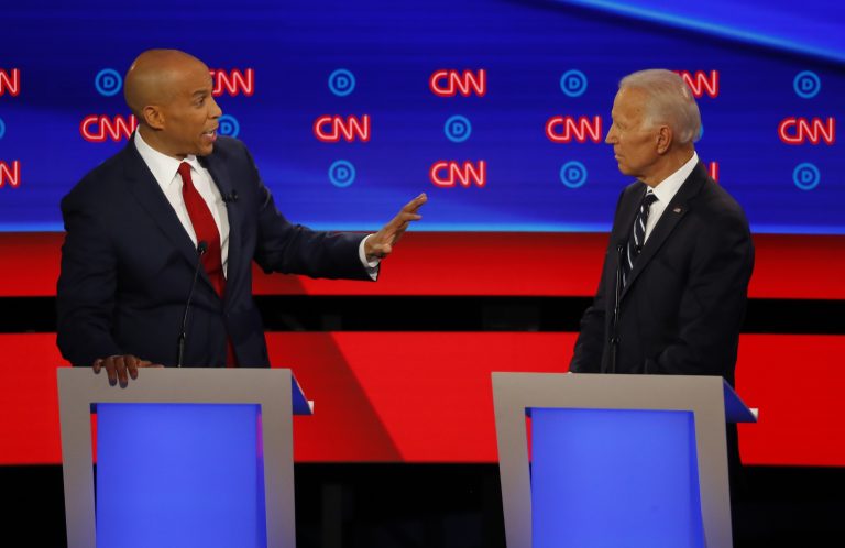 Sen. Cory Booker, D-N.J., gestures to former Vice President Joe Biden during the second of two Democratic presidential primary debates hosted by CNN Wednesday, July 31, 2019, in the Fox Theatre in Detroit. (Paul Sancya/AP Photo)