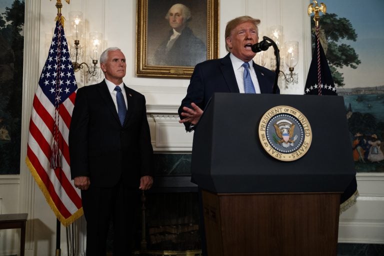 Vice President Mike Pence listens as President Donald Trump speaks about the mass shootings in El Paso, Texas and Dayton, Ohio, in the Diplomatic Reception Room of the White House, Monday, Aug. 5, 2019, in Washington. (Evan Vucci/AP Photo)