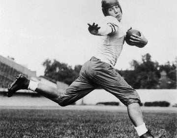 In this 1934 file photo, University of Chicago halfback Jay Berwanger is shown in the action pose that served as the model for the Heisman Trophy. In the early days of the NFL, college football was king and playing the game professionally was not necessarily something players aspired to do. (AP Photo/File)