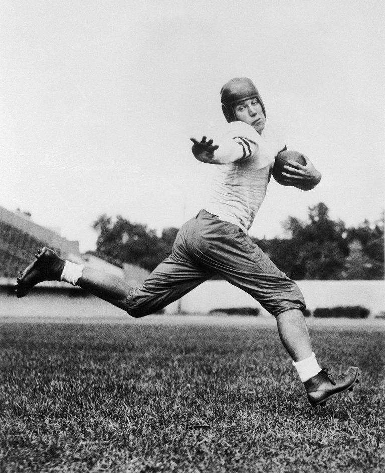 In this 1934 file photo, University of Chicago halfback Jay Berwanger is shown in the action pose that served as the model for the Heisman Trophy. In the early days of the NFL, college football was king and playing the game professionally was not necessarily something players aspired to do. (AP Photo/File)