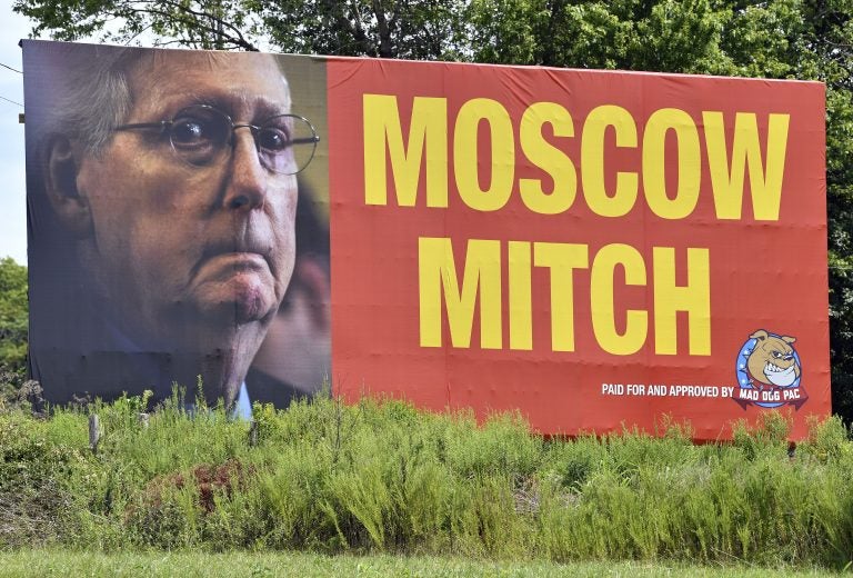 A billboard in Horse Cave, Ky., referring to Senate Majority Leader Mitch McConnell, R-Ky. as Moscow Mitch has been erected on northbound I-65 Tuesday, Aug. 13, 2019. (AP Photo/Timothy D. Easley)