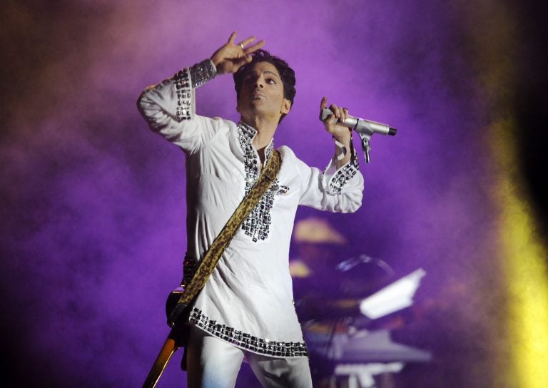 In this April 26, 2008 file photo, Prince performs during his headlining set on the second day of the Coachella Valley Music and Arts Festival in Indio, Calif. (Chris Pizzello/AP Photo)