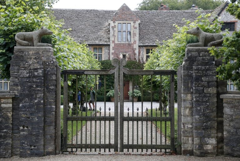 A gate protects the entrance of the Rooksnest estate near Lambourn, England, Tuesday, Aug. 6, 2019. The manor is the domain of Theresa Sackler, widow of one of Purdue Pharma’s founders and, until 2018, a member of the company’s board of directors. (Frank Augstein/AP Photo)