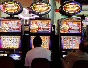 Patrons play the slot machines at Harrah's Casino in Chester, Pa. (Alex Brandon/AP Photo)