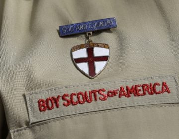 This Feb. 4, 2013 file photo shows a meal pin on a Boy Scout's uniform in Irving, Texas. (Tony Gutierrez/AP Photo)