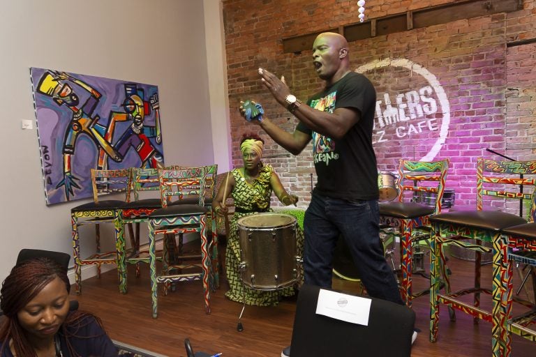 Chester Made Artistic Director Devon Walls leads the crowd in a robust song as Chester Made workshop leader Sistah Mafalda accompanies with African drumming during the Chester Made and Mandela Washington Fellowship Exchange 2019. (Greg Irvin)