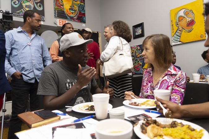 Mandela Washington Fellow, Mompoloki Makwana (left), discusses methods of community empowerment with Untours Foundation Director and Chester Made collaborator, Elizabeth Killough (right), over lunch at the Chester Made and Mandela Washington Fellowship Exchange 2019. (Greg Irvin)