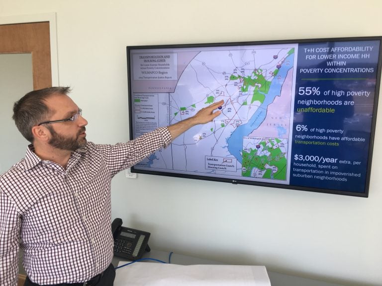 WILMAPCO’s Bill Swiatek points to a map from the group’s Transportation Justice Plan that shows the high cost of transportation and housing for those living in high poverty areas. (Mark Eichmann/WHYY)