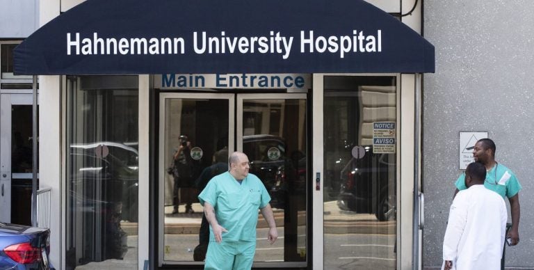 A person exits Hahnemann University Hospital in Philadelphia, Wednesday, June 26, 2019. (Matt Rourke/AP Photo)