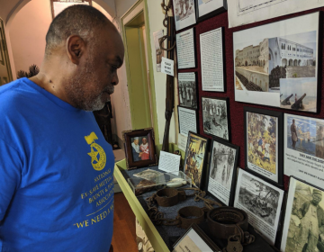 'All this stuff touches home. It doesn’t go back that far,' says Germantown resident Mark Keenheel as he looks at items in the Lest We Forget Museum of Slavery recently in August. (Michael D'Onofrio/The Philadelphia Tribune)