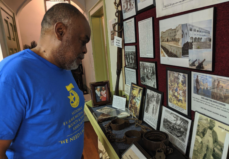 'All this stuff touches home. It doesn’t go back that far,' says Germantown resident Mark Keenheel as he looks at items in the Lest We Forget Museum of Slavery recently in August. (Michael D'Onofrio/The Philadelphia Tribune)