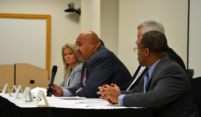 Department of Corrections Secretary John Wetzel, center, talks to reporters Aug. 28, 2019. (Brett Sholtis/WITF)