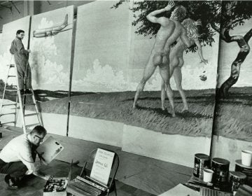 Jamie Wyeth, then in his early 20s, works from a stepladder while creating the mural for the Delaware Air National Guard. (Courtesy of Jamie Wyeth)