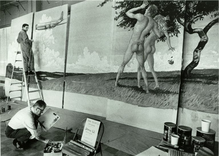 Jamie Wyeth, then in his early 20s, works from a stepladder while creating the mural for the Delaware Air National Guard. (Courtesy of Jamie Wyeth)