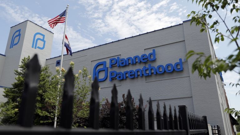 Unless a federal court intervenes, Planned Parenthood says it will formally withdraw from the nation's family planning program for low-income people. (Jeff Roberson/AP)