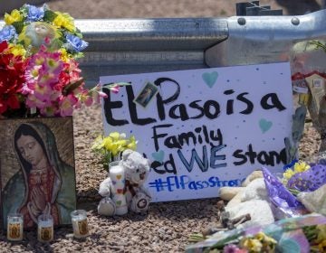 Flowers and a Virgin Mary painting adorn makeshift memorial for the victims of Saturday mass shooting at a shopping complex in El Paso, Texas, Sunday, August 4, 2019. (Andres Leighton/AP Photo)