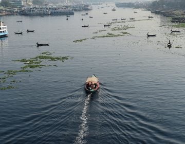 Bangladeshi commuters use boats to cross the Buriganga River in the capital Dhaka in 2018. In July, Bangladesh's top court granted all the country's rivers the same legal rights as humans. (Munir Uz Zaman/AFP/Getty Images)