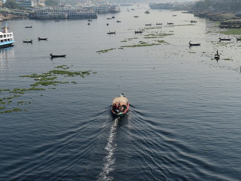 Bangladeshi commuters use boats to cross the Buriganga River in the capital Dhaka in 2018. In July, Bangladesh's top court granted all the country's rivers the same legal rights as humans. (Munir Uz Zaman/AFP/Getty Images)