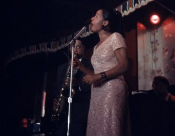 Billie Holiday performs on stage at the Sugar Hill nightclub in Newark, N.J. Farah Jasmine Griffin's 2001 book posed a challenge to biographers and helped reimagine Holiday's legacy. (Bob Parent/Getty Images)