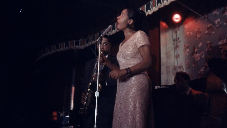 Billie Holiday performs on stage at the Sugar Hill nightclub in Newark, N.J. Farah Jasmine Griffin's 2001 book posed a challenge to biographers and helped reimagine Holiday's legacy. (Bob Parent/Getty Images)