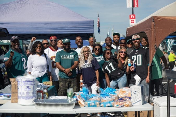 A group of friends from Coatesville have been coming together for 8 years for the Eagles season opener. (Emily Cohen for WHYY)