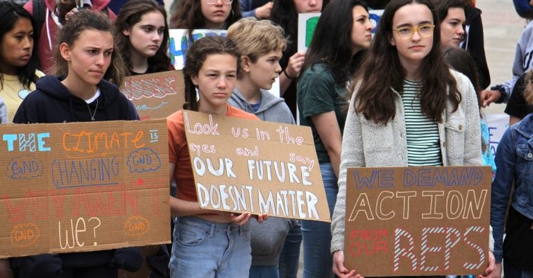 Philadelphia students cut class on Friday, May 3, 2019 to participate in a rally at Thomas Paine Plaza to protest inaction on climate change issues. (Emma Lee/WHYY)