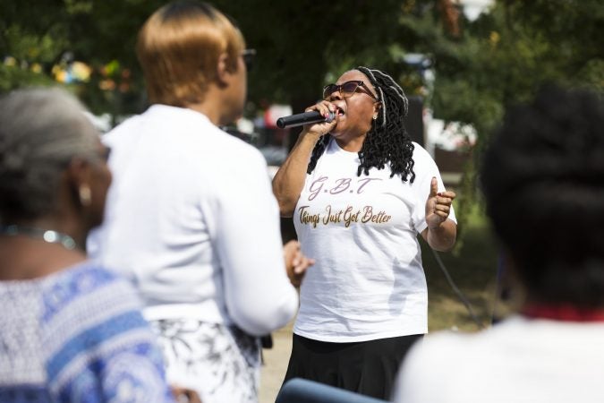 Evangelist Brenda Rogers leads prayer during Sunday morning services at the Greater Bible Way Temple on Sept. 1, 2019. (Rachel Wisniewski for WHYY)